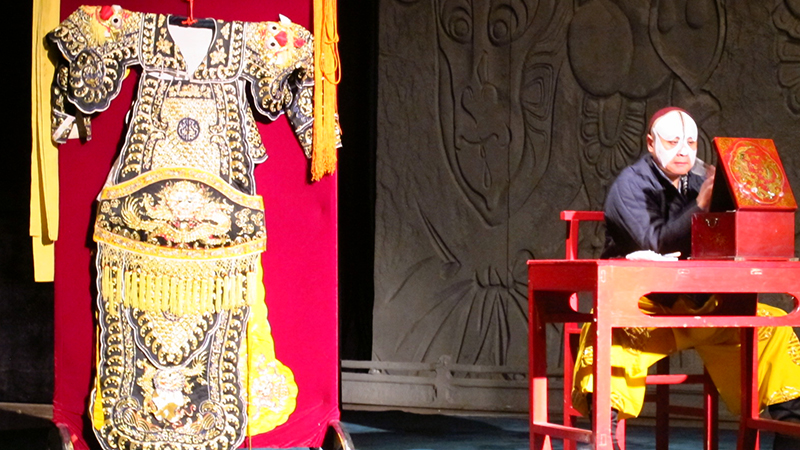 The actor is making up for a Peking Opera