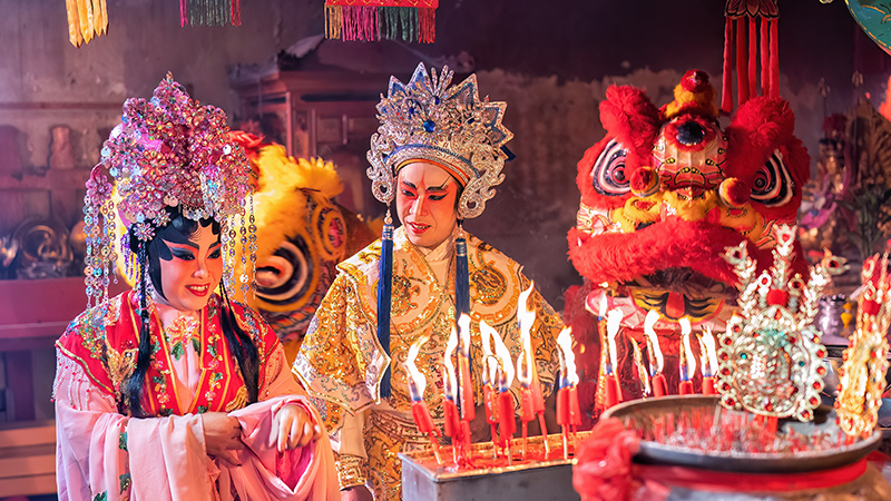 Chinese opera actors are praying for prosperity during the Lunar New Year