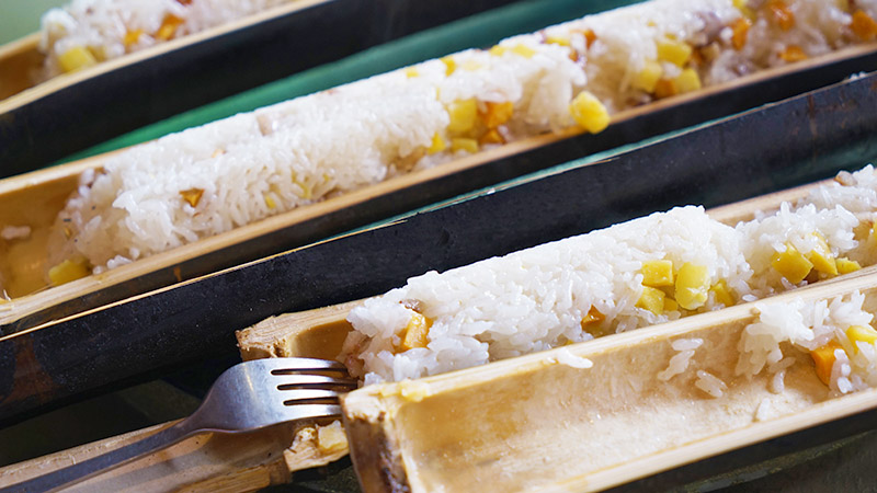 Steamed rice in bamboo tube