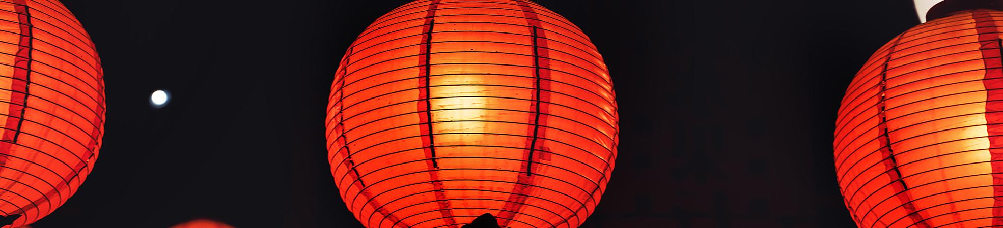 Red lanterns light up at night