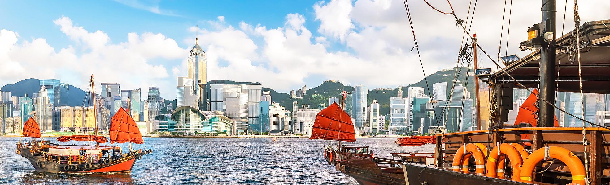 Victoria Harbor In Hong Kong With Vintage Ship